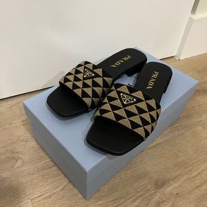 Prada Black and Gold Geometric Slide Sandals